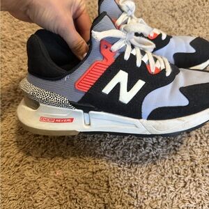 New Balance Black, White, and Red Sneakers